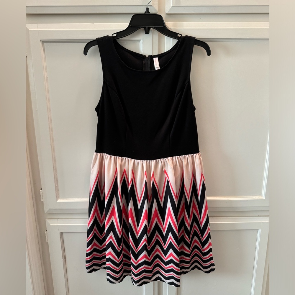 Dress- solid black top with a pink/black/beige skirt